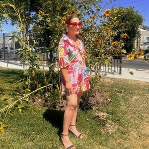 Colorful Floral Dress with Red Sunglasses